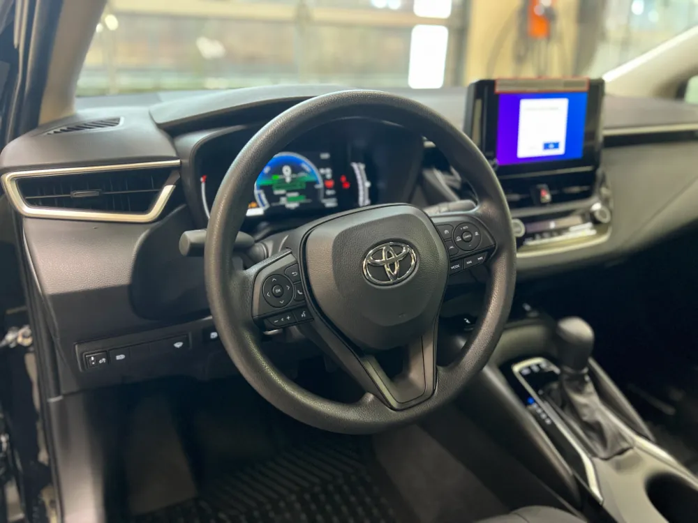 2023 toyota corolla hybrid le in black 12